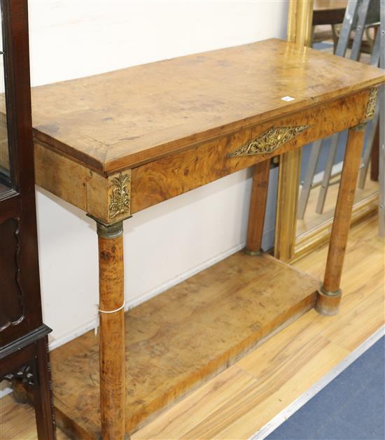 A 19th century burr elm console table with brass mounts W.113cm.